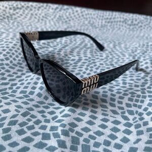 Miu Miu Black and Gold Sunglasses